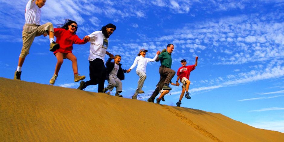 people enjoying sahara desert