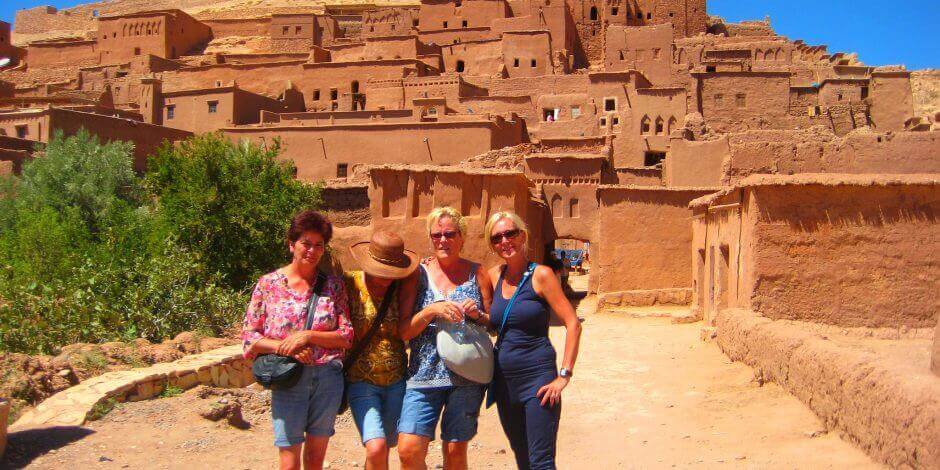 tourists in kasbah ait ben haddou