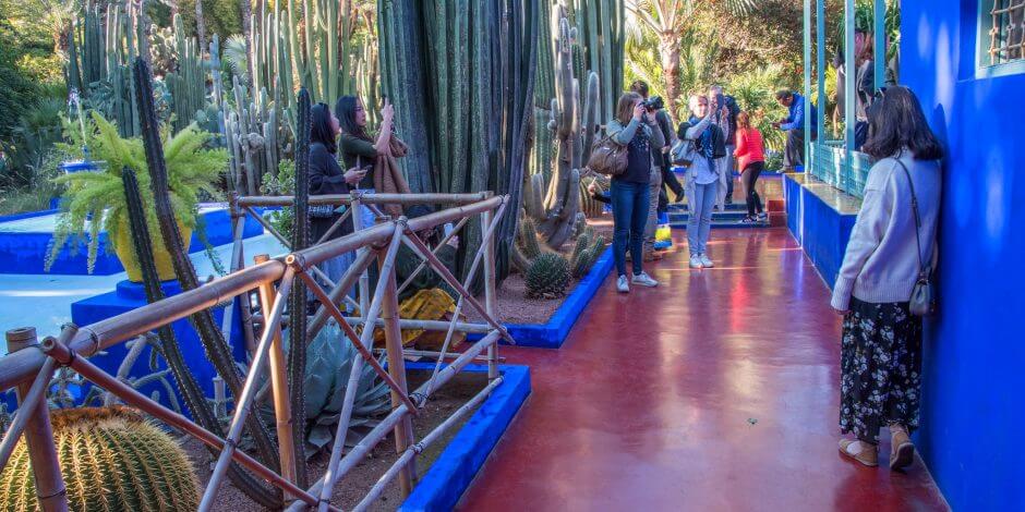 tourists inside majorelle garden marrakech