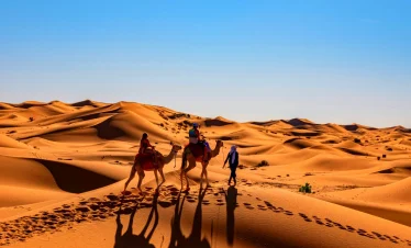 couple riding camel in Morocco Sahara, Marrakech Sahara Tour,